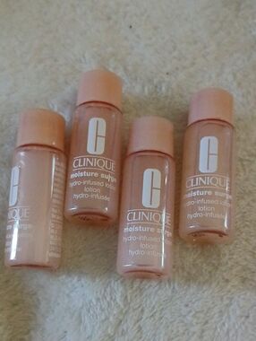 Clinique Moisture Surge Hydro-Infused Lotion - 4 PACK - TSA APPROVED SIZE 7mL